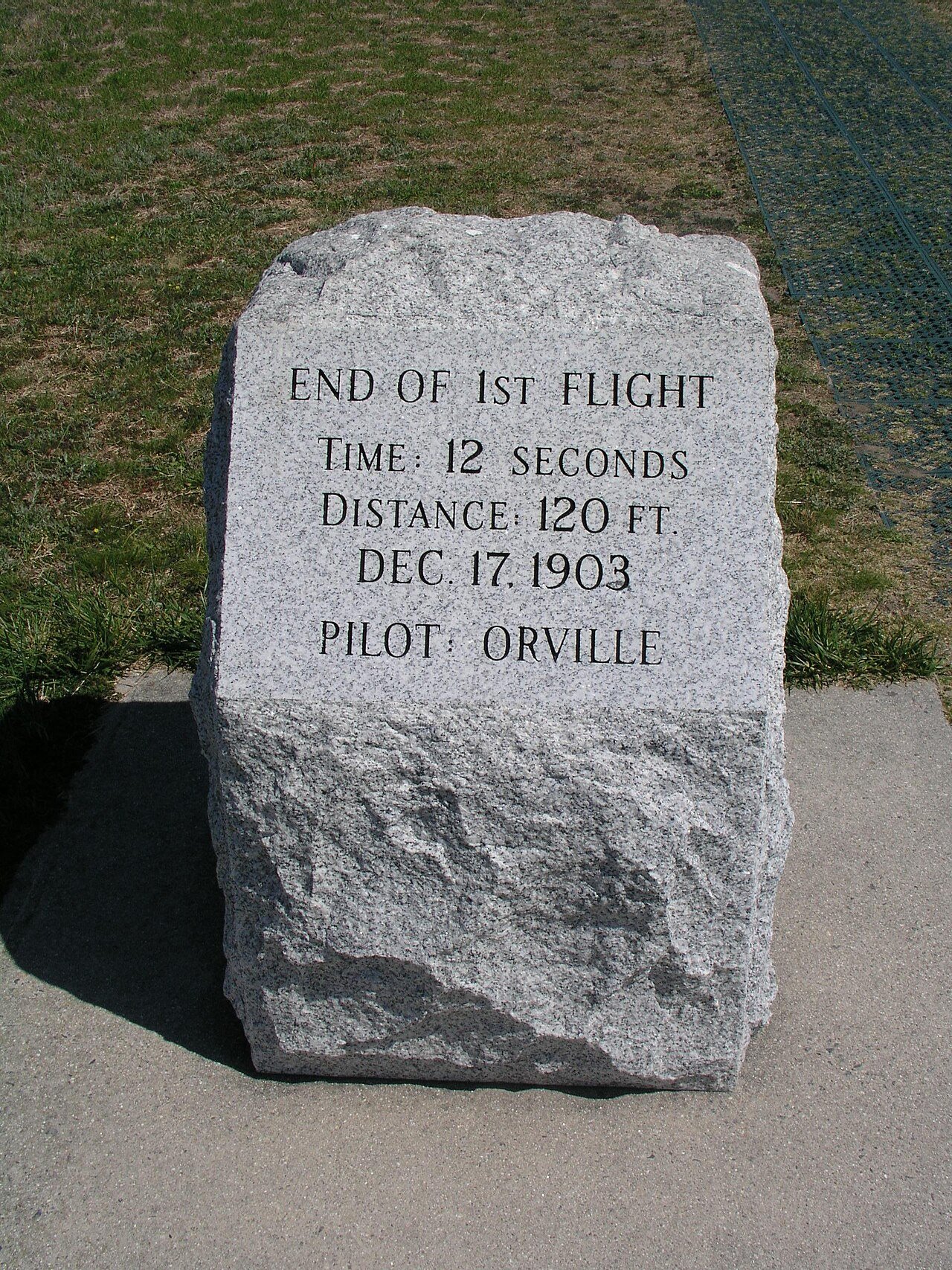 The Wright Flyer rising from launching rail during the first flight of 120 feet