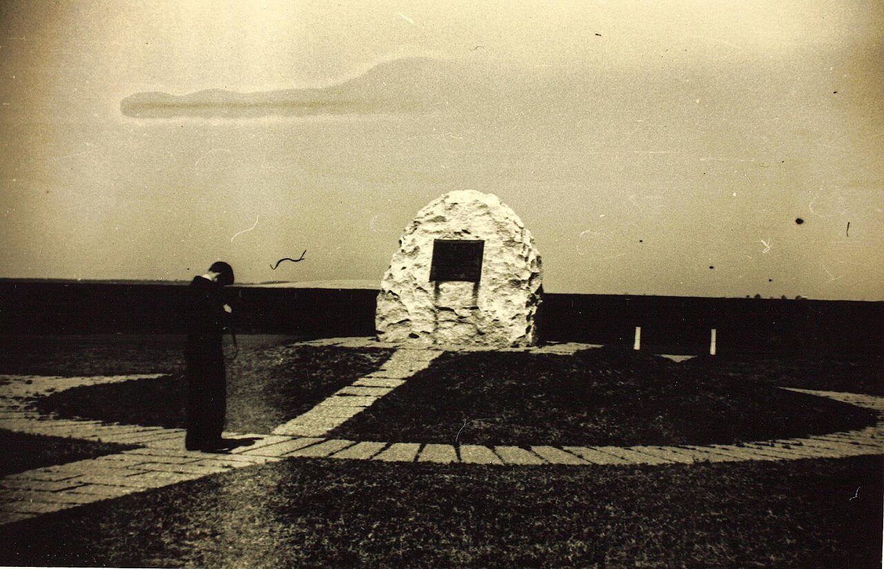 Orville Wright piloting the 1903 Wright Flyer during the first powered flight on December 17, 1903