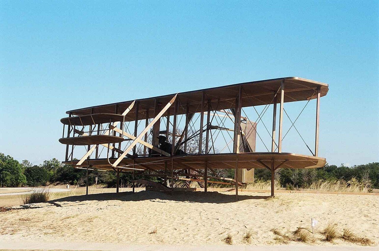 Life-sized bronze sculpture of the 1903 Wright Flyer at the memorial