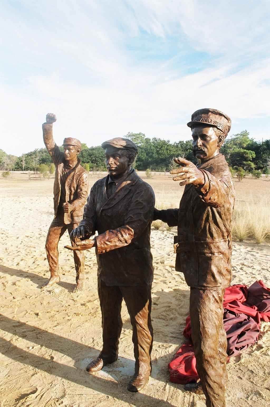 Bronze sculpture of the lifesavers who witnessed the first flight